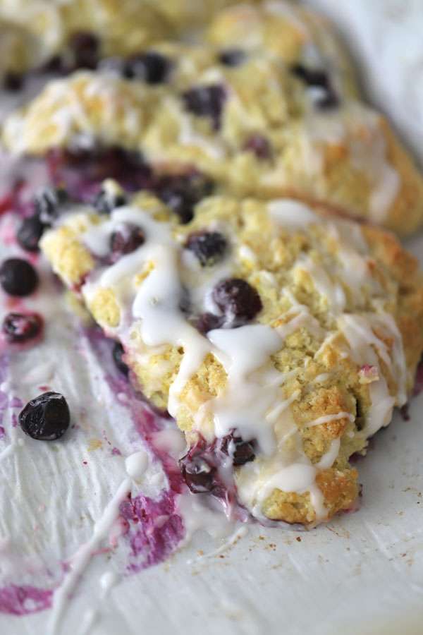 Einkorn scone with blueberry and lemon on a parchment paper