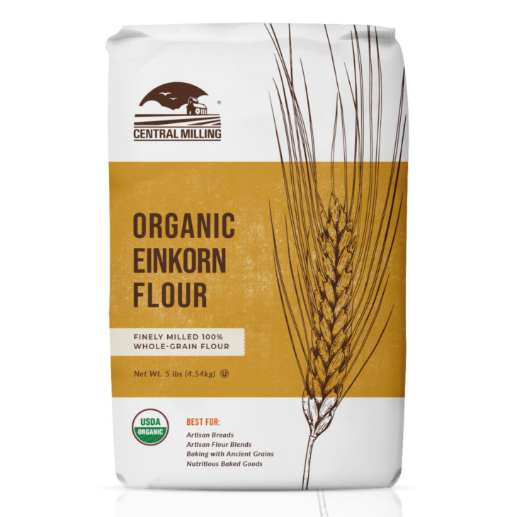 Tan and white bag of Central Milling Organic Einkorn Flour with a wheat stalk graphic.